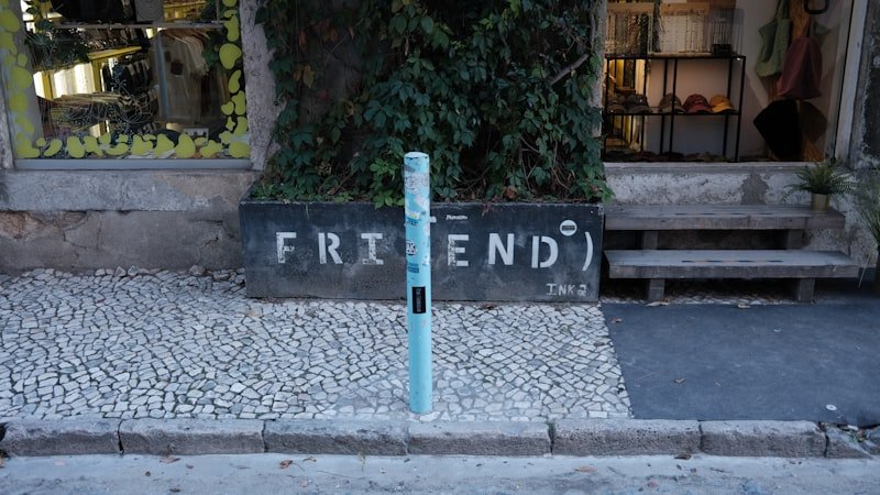 a street sign sitting on the side of a road