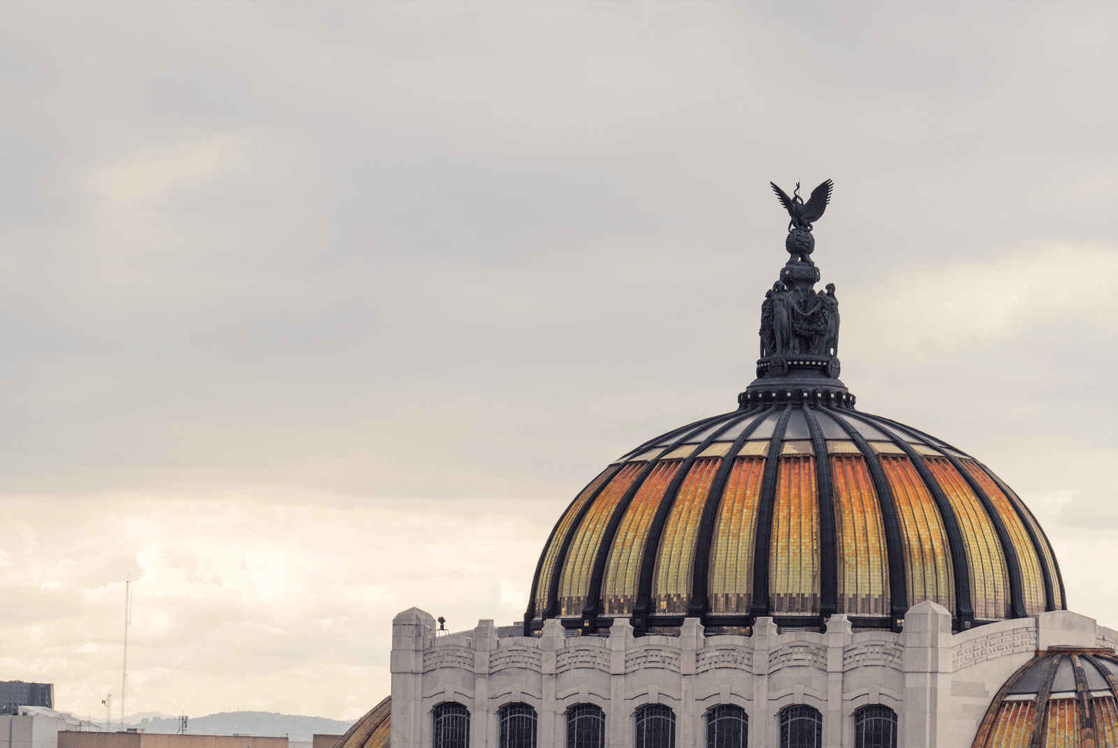 Stunning view of the Palacio de Bellas Artes dome in Mexico City, at twilight.