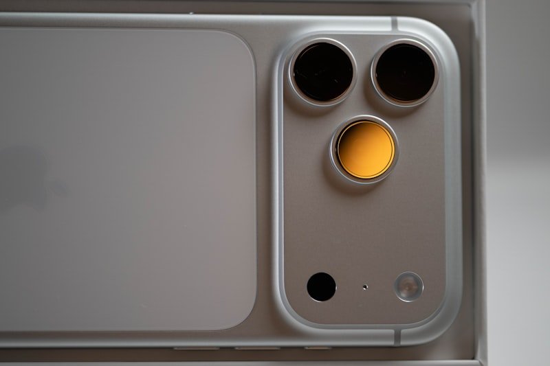 Close-up of a silver smartphone camera module.