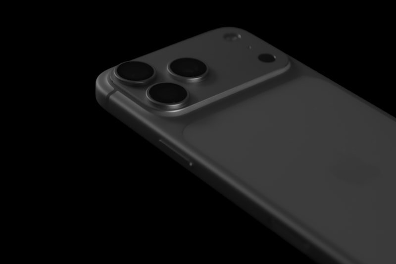 Close-up of a dark smartphone with three cameras.