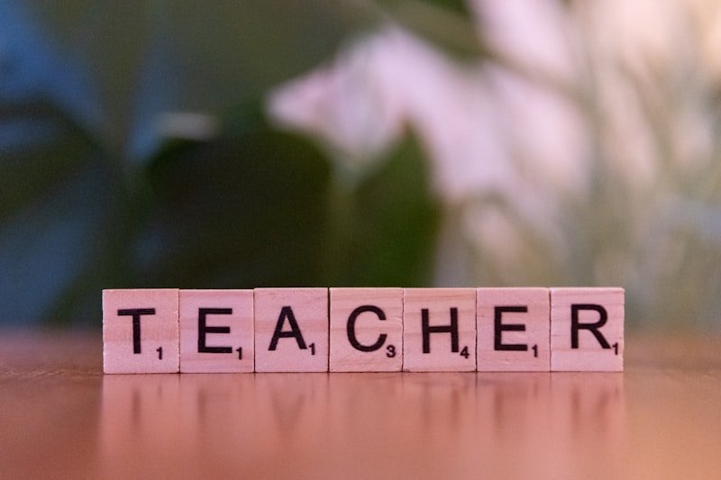 A wooden block spelling out the word teacher