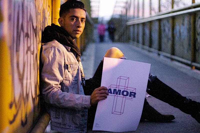 man in brown jacket holding white printer paper
